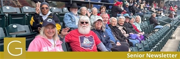 Senior Center members sitting together at a Cleveland Guardians Baseball game