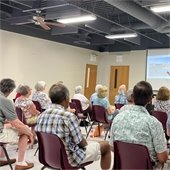 GASAC group members watching a presentation