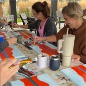 Gahanna residents painting at an arts program