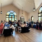 A full room of attendees and vendors at the Senior Expo
