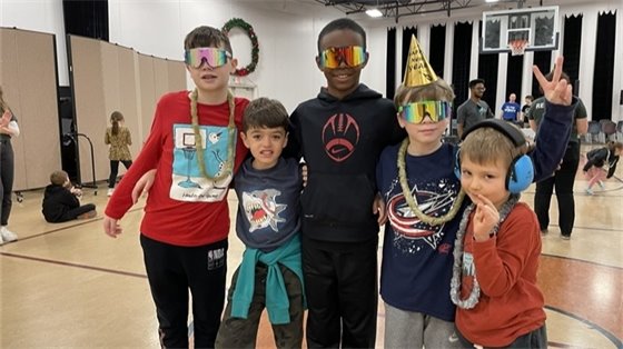 A group of students at the noon years eve party during winter break camp