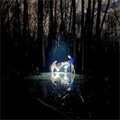 A group exploring the outdoor ecosystem during a MAD scientist program