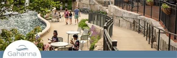 Photo of families hanging out at Creekside on a sunny day
