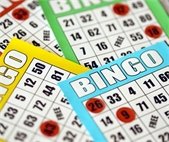 A table full of bingo cards