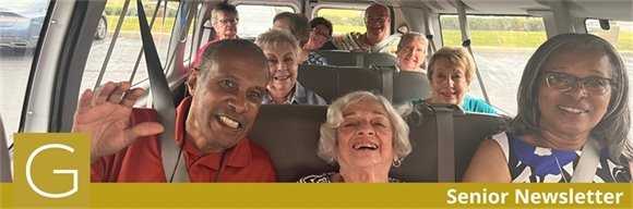  a group of senior center member smiling and laughing together in a van