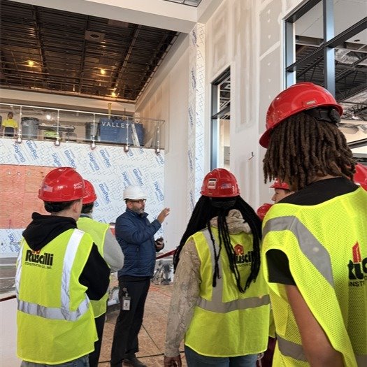 Kevin Schultz hosting a tour of EFCTS Architecture & Construction Management students at 825 Tech Center Dr