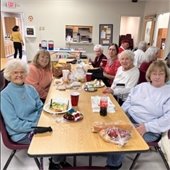 Senior Center residents sharing a meal