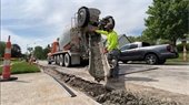 Gahanna Construction workers pouring pavement