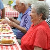 Senior citizens enjoying some snacks