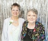 two senior center members at senior prom