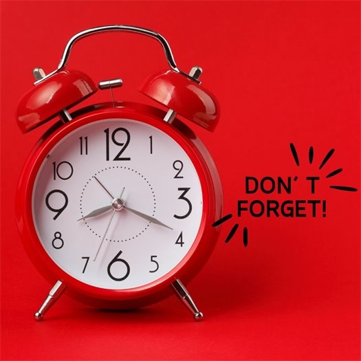 Red alarm clock with "Don't Forget!" text