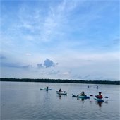 a group of celestial paddlers kayaking on Hoover Reservoir