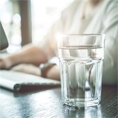 water glass sitting on desk