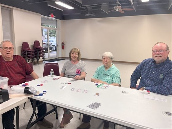 Senior citizens playing texas hold 'em