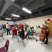 GLHS Orchestra performing at Holiday Brunch