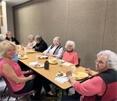 Senior citizens enjoying lunch