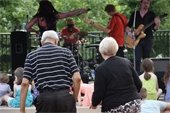 Elderly couple dancing outdoors at a community festival in Gahanna