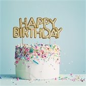 Happy Birthday cake and confetti