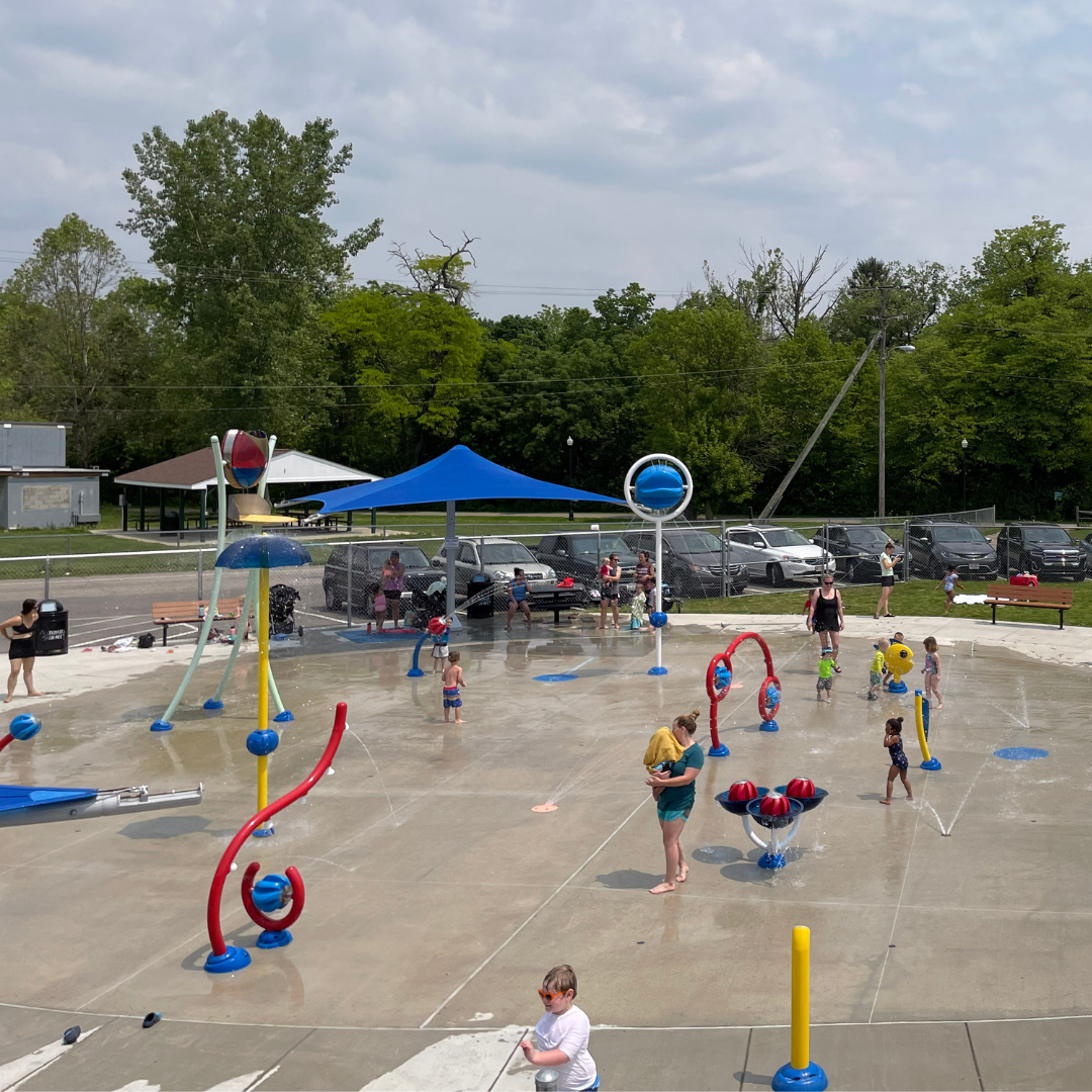 Photo of families enjoying the Gahanna Splashpad on a sunny day