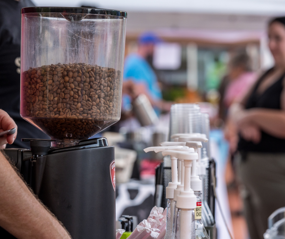 A close up of a hopper of coffee beans from a coffee vendor at the Gahanna Market